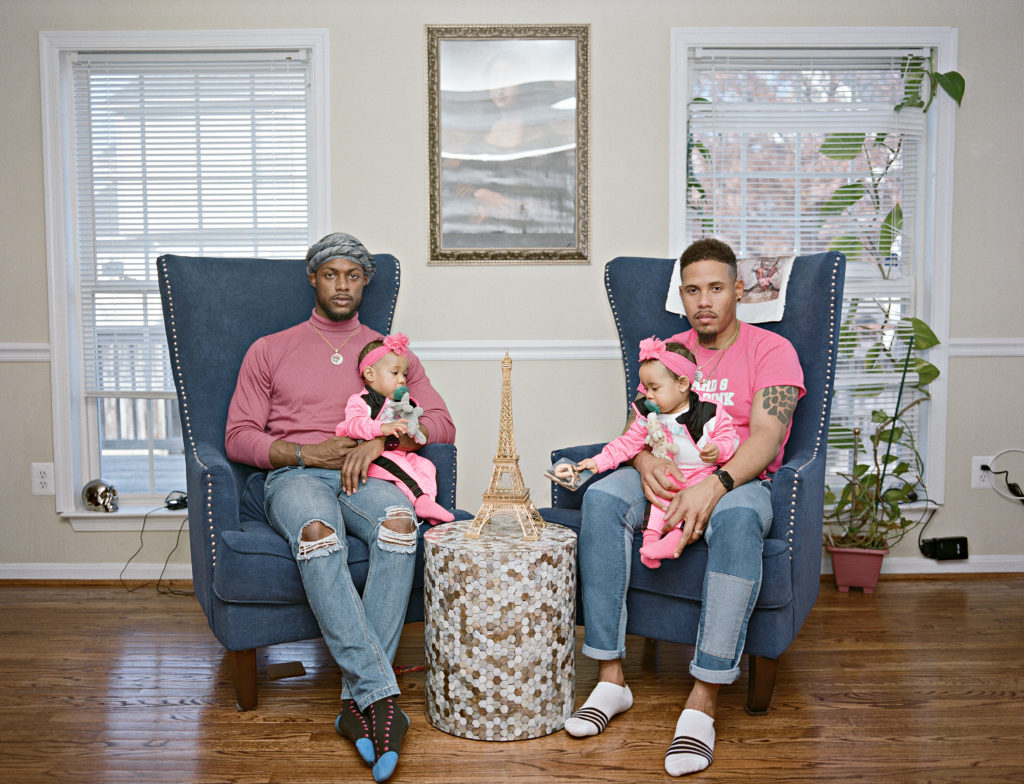 Vernon and Ricardo with their twin girls at home. Clinton, Maryland © Bart Heynen from 'Dads' published by powerHouse Books
